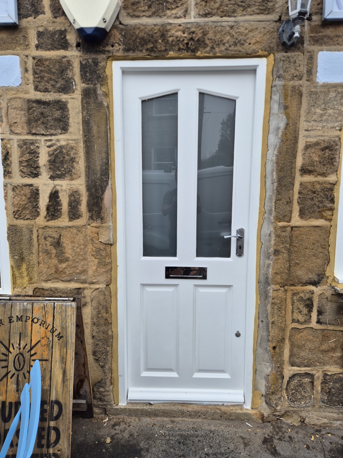 Fitted front door in a traditional stone property